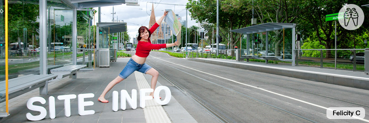 Tight denim shorts stretched against her legs.